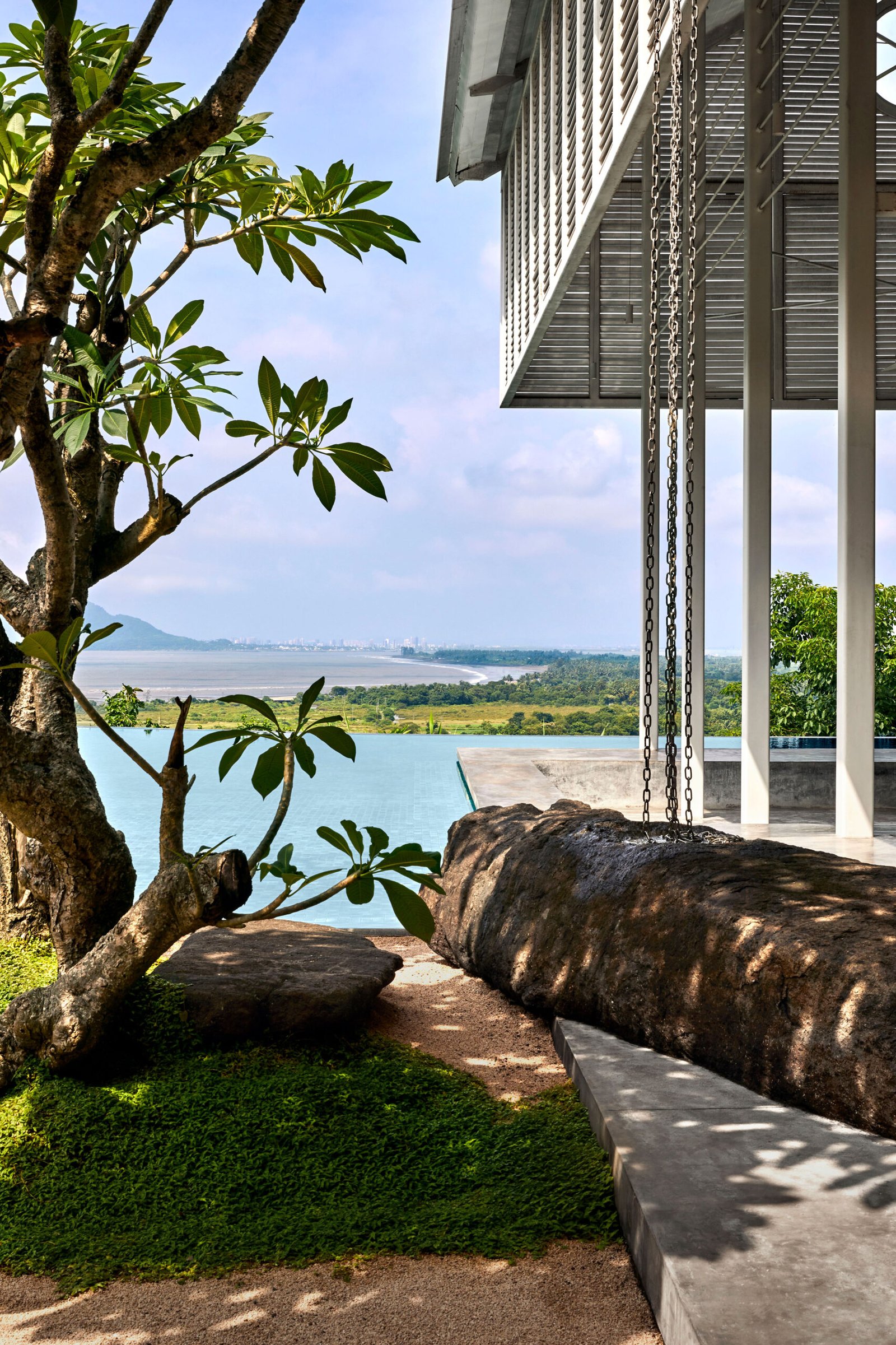 large boulder on the edge of infinity pool