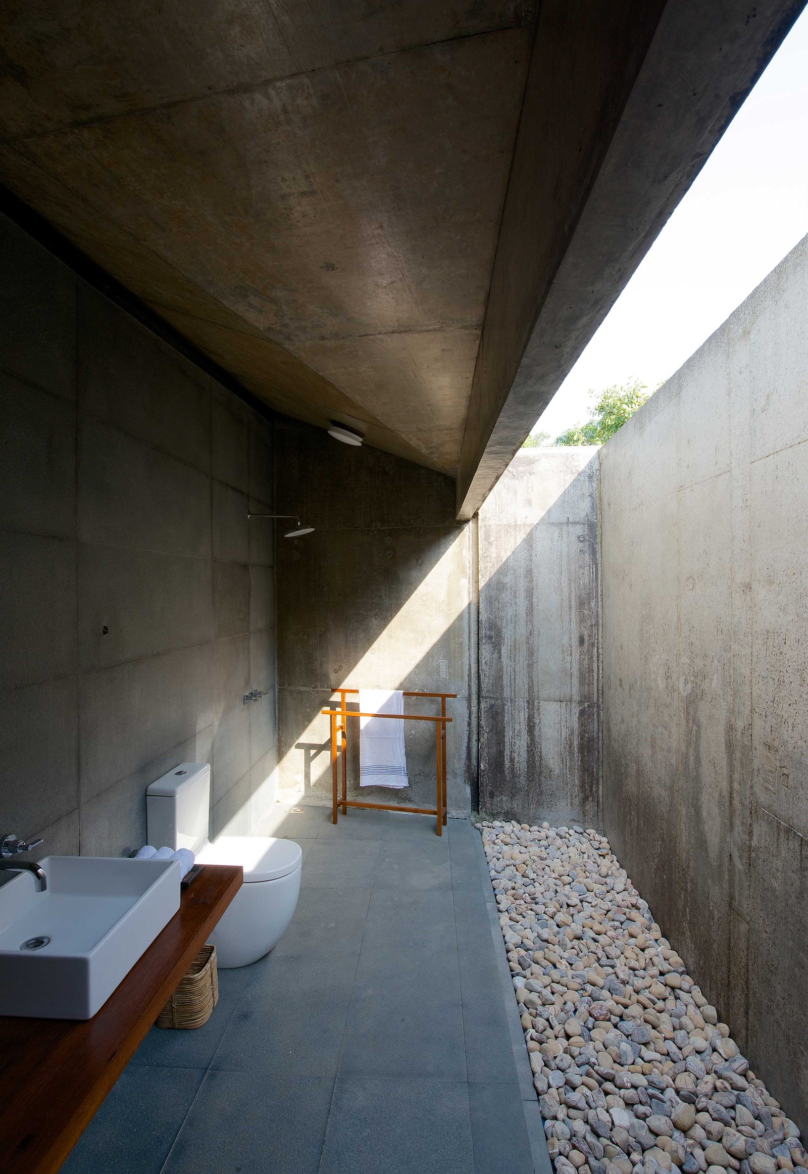 bathroom with courtyard house on a stream alibaug