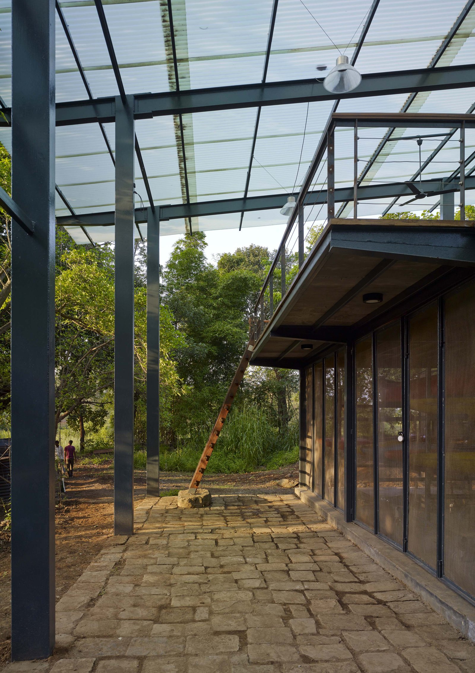 ladder to upper deck at magic bus learning pavilion Karjat india in Domus magazine