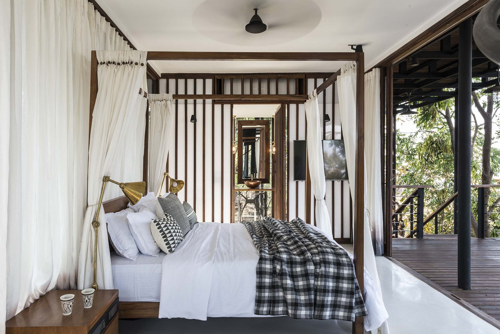 four poster bed at tala treehouse villa alibaug india